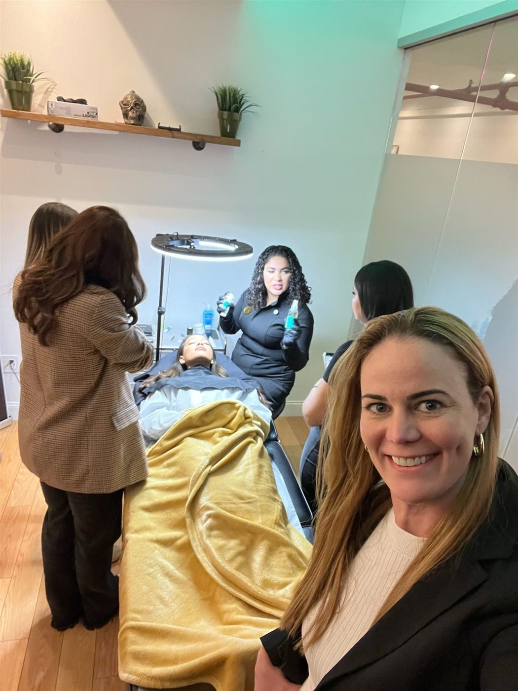 Harlenne in a hands-on training room
